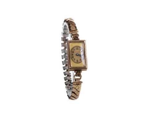 LADY'S ROLEX PRIMA ART DECO NINE CARAT GOLD MANUAL WIND WRIST WATCH,the rectangular champagne dial with central oval section,