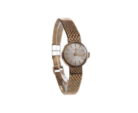 LADY'S ETERNA NINE CARAT GOLD MANUAL WIND WRIST WATCH,the round cream dial with applied baton hour markers, 16mm case, on a n