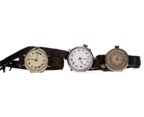 THREE LADY'S SILVER CASED MANUAL WIND WRIST WATCHES,each on black straps, along with a lady's UNO manual wind wrist watch, la