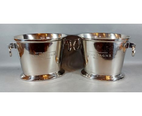 A pair of large oval Champagne coolers with circular ring side handles bearing inscription, 25cms tall 