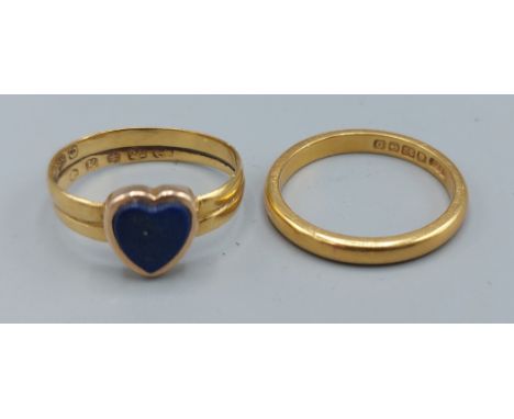 A 22ct gold band ring set with a blue stone in the form of a heart together with a 22ct gold wedding band, 6.2gms 