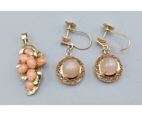 A 14ct gold coral set pendant together with a pair of 14ct gold earrings, 8.3gms 
