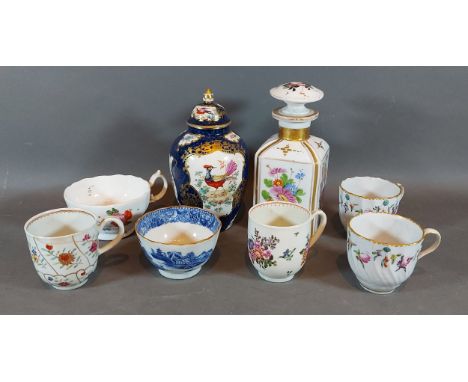 A Paris porcelain decanter together with a collection of 19th Century cups and a Worcester style covered vase 