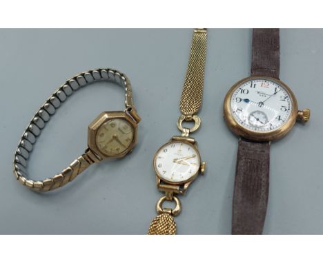 An Omega 9ct gold cased ladies wristwatch together with a 9ct gold cased ladies wristwatch by Rotary and a 9ct gold cased gen