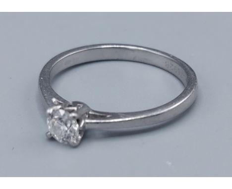 A white metal solitaire diamond ring, 0.33ct, claw set, 3.6gms, ring size O 
