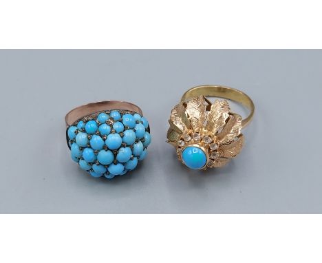 A yellow metal torquoise set ring together with another similar ring, 14.2gms 