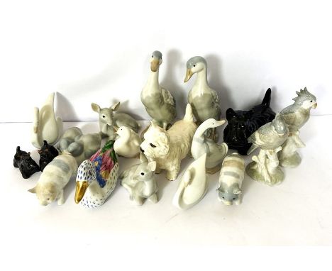 A selection of fine ceramic animals, including a Beswick Scottie dog and a Beswick West Highland White terrier, also various 