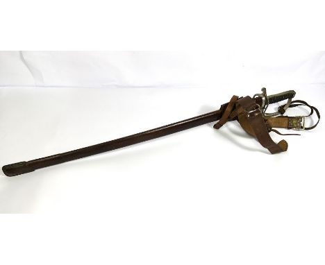 An British Army WWI officers sword and scabbard, the blade stamped 12796, scrolled guard and wired handle, 106cm long,&nbsp;