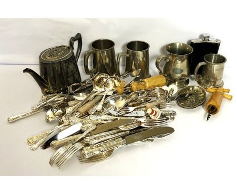 A large assortment of silver plated flatware and related items, including four tankards, a hip flask, two corkscrews, teapot,