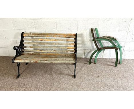 A vintage cast iron and wood slatted garden bench; also a pair of cast bench ends, and a set of four metal framed stacking ch