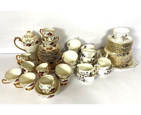 A Roslyn fine bone china tea and coffee service, decorated with roses and gilt borders, including a coffee pot; also a Royal 