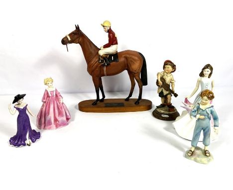 A small group of assorted ceramic figurines, including a Beswick model of Red Rum with jockey up and four fashionably dress l