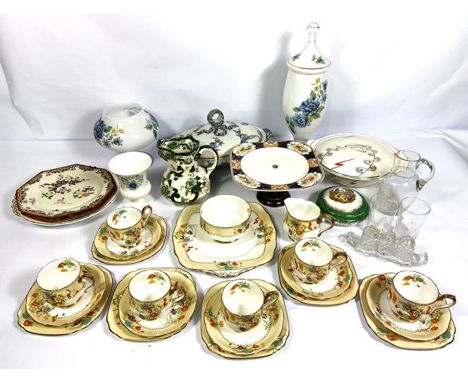 A group of assorted ceramics, including a colourful floral painted tea service, a painted glass vase, assorted glassware and 