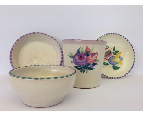 A Carter Stabler Adams Limited Poole Pottery miniature plant pot and saucer, shape 561, decorated in the WW pattern together 