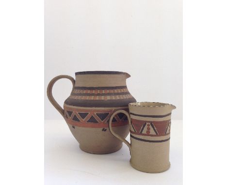 An unglazed Carter Stabler Adams Limited Poole Pottery jug, shape 300, decorated in the YX pattern, in the style of James Rad