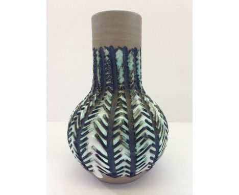 A Poole Pottery Atlantis vase, thrown by Guy Sydenham and Susan Dipple in a carved pale green and white glazed Feather Effect