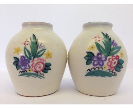 A pair of miniature Poole Pottery vases, shape 585, decorated in the AV pattern.
