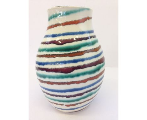 A modern Poole Studio vase, in a multi coloured stripe pattern pattern, hand thrown by Alan White, decorated by Nikki Massare