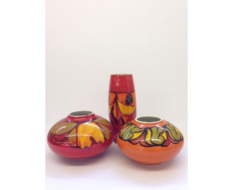 Two Poole Pottery Delphis Onion vases together with a vase, shape 15.