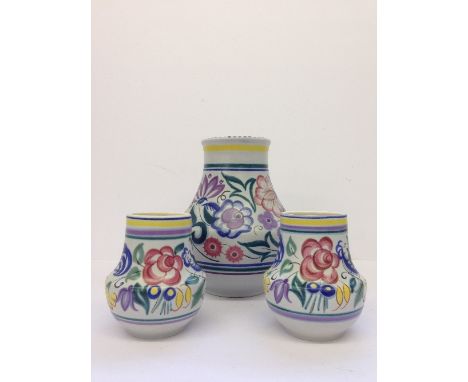 A Poole Pottery vase, decorated in the CS pattern together with a pair of LE small vases.