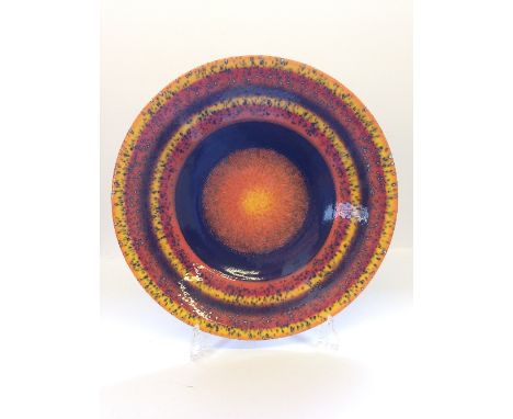 A Poole Pottery Planets charger: Venus from a Limited Edition by Alan Clarke to mark the alignment of the planets 5.5.2000.
