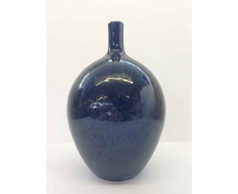 A modern Poole Studio black glazed bottle shaped vase, hand thrown by Alan White (10.5").