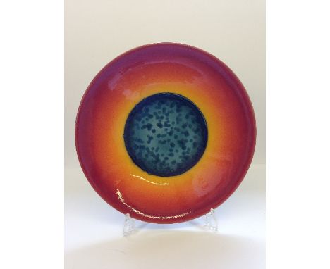 A Poole Pottery Planets charger: Neptune from a Limited Edition by Alan Clarke to mark the alignment of the planets 5.5.2000.