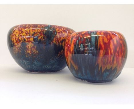 A modern Poole Pottery Living Glaze range bowl, decorated in the Sunburst pattern together with a matching smaller bowl.