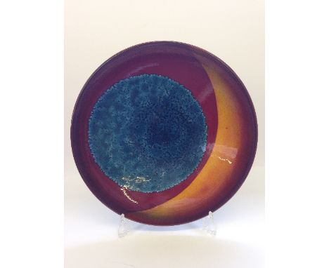 A Poole Pottery Planets charger: Earth from a Limited Edition by Alan Clarke to mark the alignment of the planets 5.5.2000.