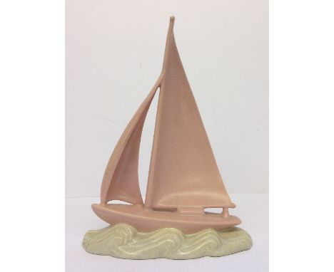A Poole Pottery Racing Yacht, probably designed by John Adams and modelled by Harry Brown, circa 1937 - 1938 in pink and seag
