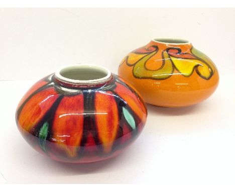 A Poole Pottery Delphis Onion vase, shape 32, decorated in an abstract pattern in tones of orange, blue and red by Janet Lair