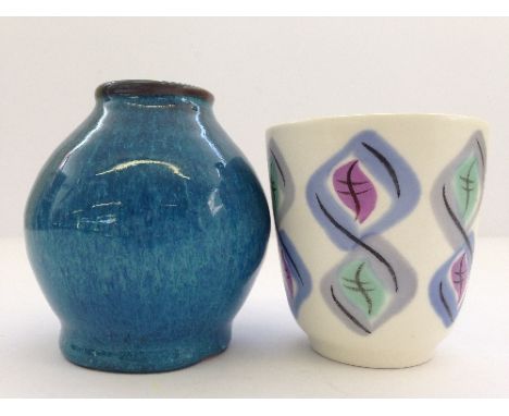 A Poole Pottery miniature Chinese blue glazed vase together with a miniature Freeform vase decorated in the HOL pattern.