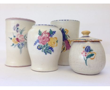 Four various small Carter Stabler Adams and Poole Pottery vases and mustard pot in various designs.