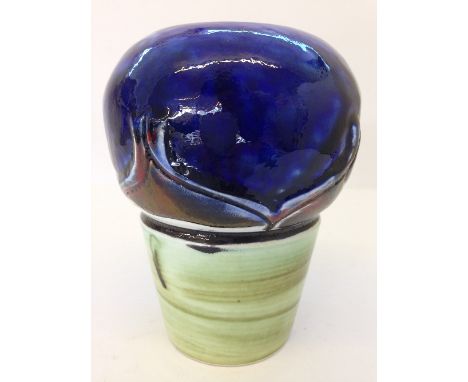 A Poole Pottery Delphis vase of unusual form, decorated in tones of blue, red and green (6").