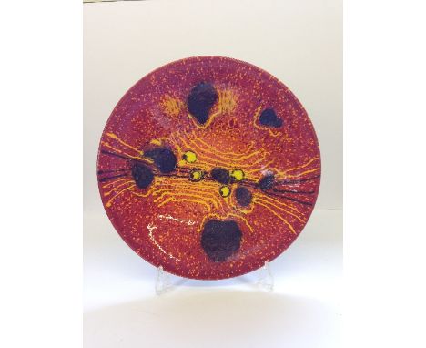 A Poole Pottery Planets charger: Saturn from a Limited Edition by Alan Clarke to mark the alignment of the planets 5.5.2000.