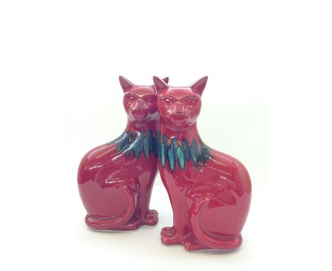 A pair of  Poole Pottery red Delphis Vogue Cats in a sprayed and painted design by Alan Clarke (11.5").