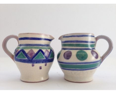 A miniature Poole Pottery jug, shape 725, decorated in the KZ pattern by Phyllis Way together with another, decorated in the 