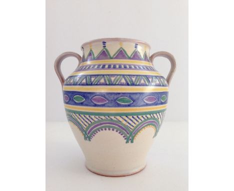 An early Carter Stabler Adams Limited Poole Pottery twin handled vase, decorated in the XF pattern by Margaret Holder.