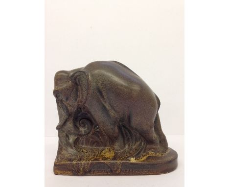 A Carter Stabler Adams Poole Pottery brown glazed elephant book end (813), designed by Harold Brownsword, circa 1928-1930 (6.