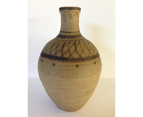 An early unglazed Carters & Co., Poole vase with brown slip decoration on high fired biscuit, originating from a design by Ja