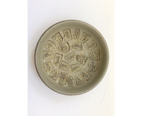 A Guy Sydenham Green Island dish, decorated with multiple incised designs of the Sails of the old Poole Merchants, 16 - 18 Ce