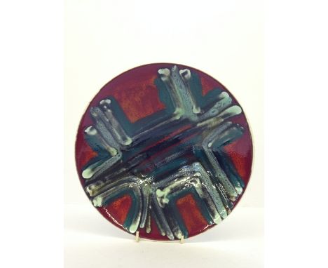 A Poole Pottery Delphis flared bowl, shape 57, decorated in an abstract pattern in tones of green, blue, black and red by Bet