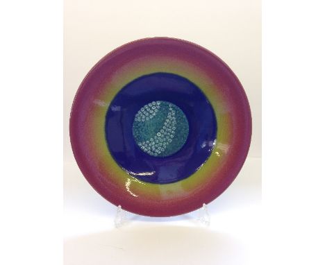 A Poole Pottery Planets charger: Uranus from a Limited Edition by Alan Clarke to mark the alignment of the planets 5.5.2000.