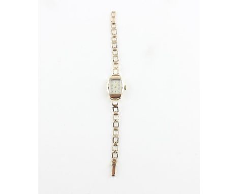 A 9ct. gold ladies' bracelet watch, manual movement signed Bentima Star, having silvered rectangular Arabic numeral dial, 17m