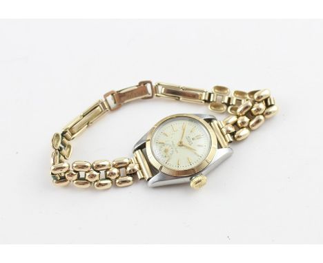 A stainless steel Rolex Oyster Precision ladies' wrist watch, manual movement, having signed white dial with raised gold bato