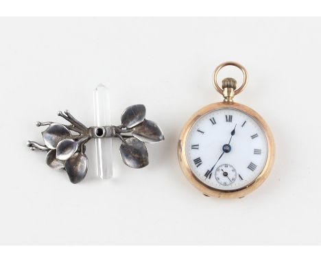 A ladies' 9ct. gold pocket watch, crown wind, having white enamel Roman numeral dial and Arabic numeral subsidiary seconds di