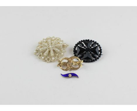 A yellow metal, blue enamel and pearl pendant/brooch, fashioned as a ribbon tied into a figure of eight, with allover scrolli