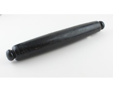 A Victorian folk art black glass rolling pin, of typical gently convex form, engraved with twin anchors to chain and rope, an