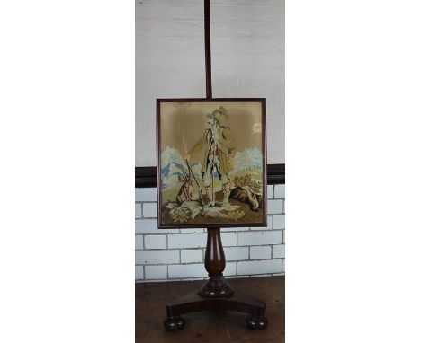 A 19th centry mahogany firescreen with original Berlin woolwork panel