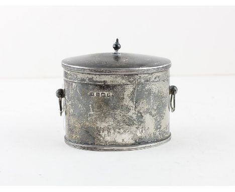 A silver tea caddy, of ovoid form, by Lawrence Emanuel, assayed Birmingham 1914, having gently domed lid with ribbed rim surm